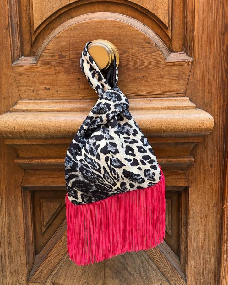 japanese knot bag with fuchsia fringe